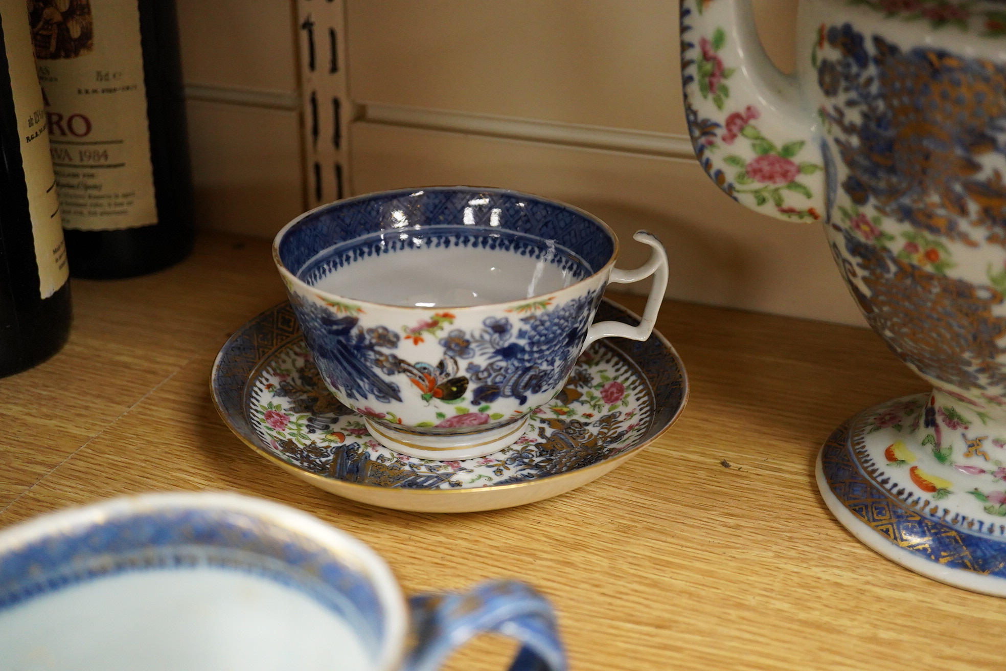An early 19th century Chinese porcelain part tea set and matching sauce boat - teapot 25cm high